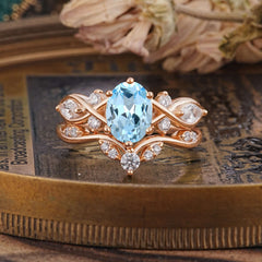 The Sumptuous Oval - Cut Aquamarine Halo Ring