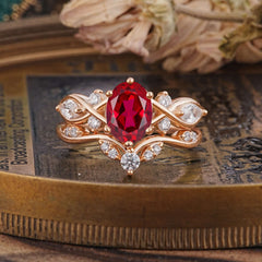 The Sumptuous Oval - Cut Ruby Halo Ring