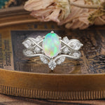 The Sumptuous Oval - Cut Fire Opal Halo Ring - Additional view