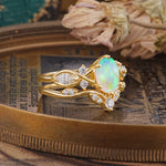 The Sumptuous Oval - Cut Fire Opal Halo Ring - Additional view