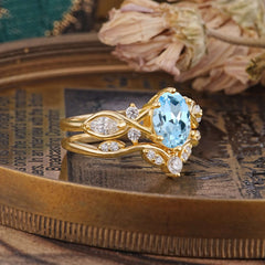 The Sumptuous Oval - Cut Aquamarine Halo Ring