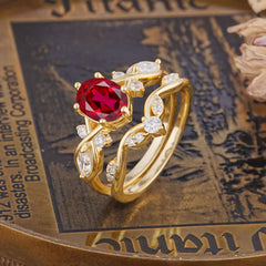 The Sumptuous Oval - Cut Ruby Halo Ring