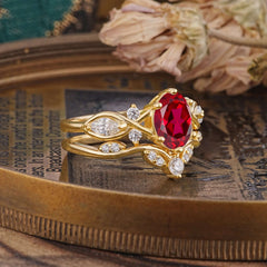 The Sumptuous Oval - Cut Ruby Halo Ring