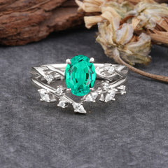 Nature-Inspired Oval Cut 4 Prong Emerald Engagement Ring Set