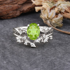 Nature-Inspired Oval Cut 4 Prong Peridot Engagement Ring Set
