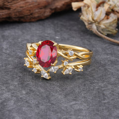 Nature-Inspired Oval Cut 4 Prong Ruby Engagement Ring Set