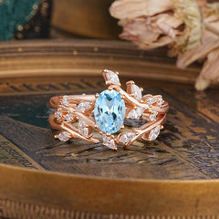 Romantic Nature-inspired 4-Prong Oval Cut Aquamarine Stacking Ring