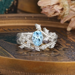 Romantic Nature-inspired 4-Prong Oval Cut Aquamarine Stacking Ring