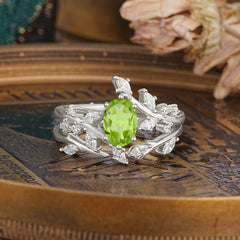 Romantic Nature-inspired 4-Prong Oval Cut Peridot Stacking Ring
