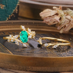 Romantic Nature-inspired 4-Prong Oval Cut Emerald Stacking Ring