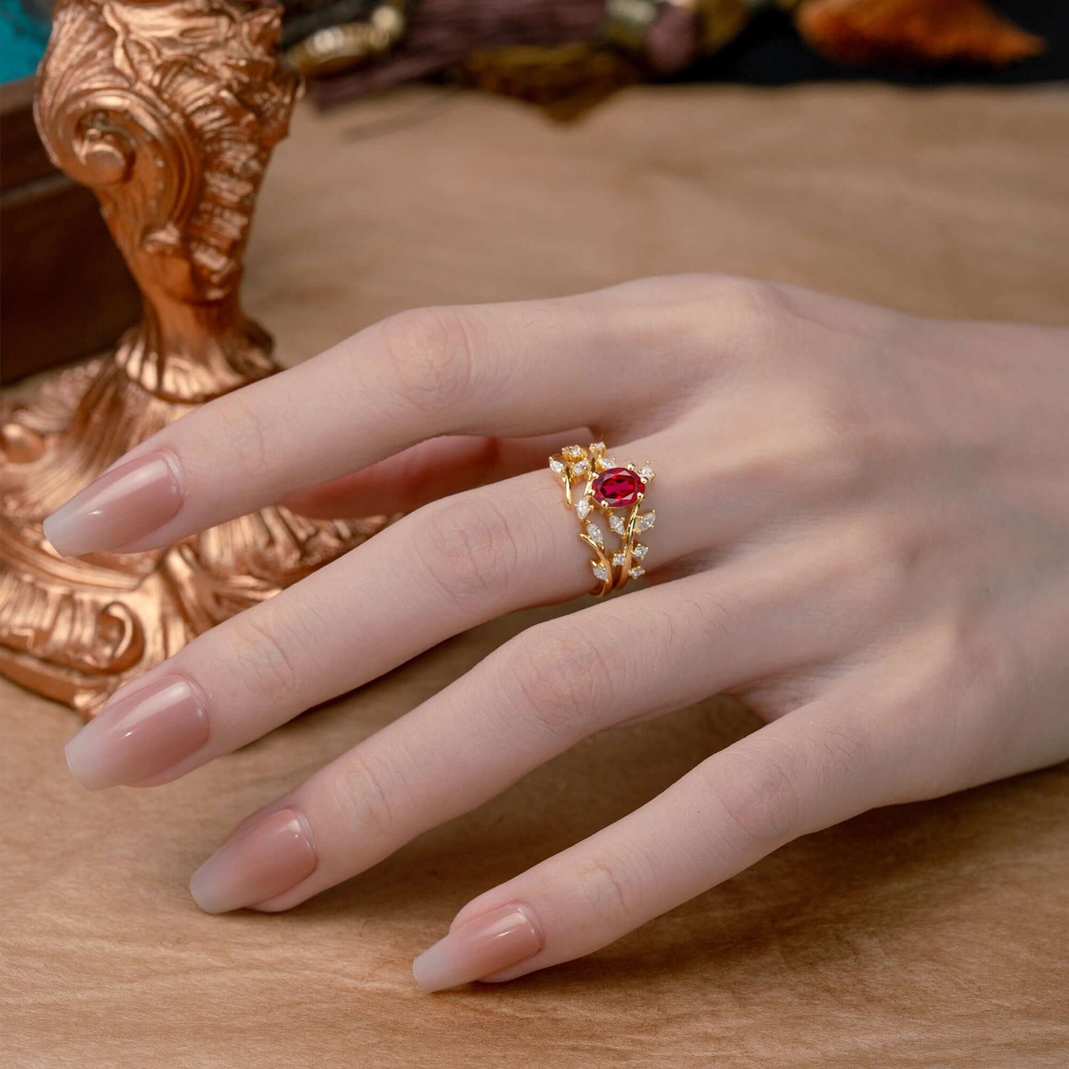 Romantic Nature-inspired 4-Prong Oval Cut Ruby Bridal Ring Set