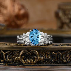 Nature-inspired 4-Prong Oval Cut Aquamarine Stacking Ring