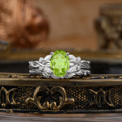Nature-inspired 4-Prong Oval Cut Peridot Stacking Ring