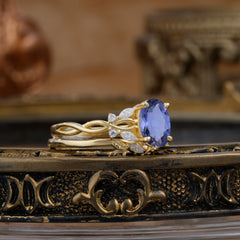 Nature-inspired 4-Prong Oval Cut Tanzanite Stacking Ring