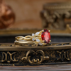 Nature-inspired 4-Prong Oval Cut Garnet Stacking Ring