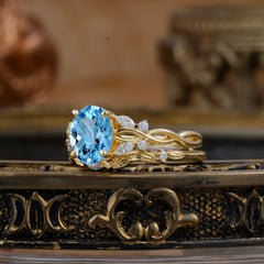 Nature-inspired 4-Prong Oval Cut Aquamarine Stacking Ring