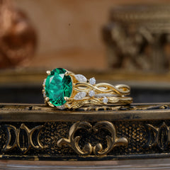 Nature-inspired 4-Prong Oval Cut Emerald Stacking Ring
