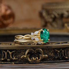 Nature-inspired 4-Prong Oval Cut Emerald Stacking Ring