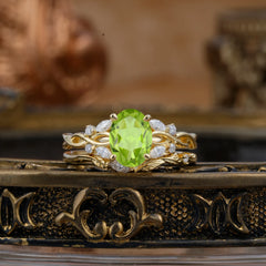 Nature-inspired 4-Prong Oval Cut Peridot Stacking Ring