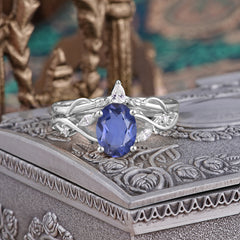 Enchanted 4-Prong Oval Cut Tanzanite Stacking Ring