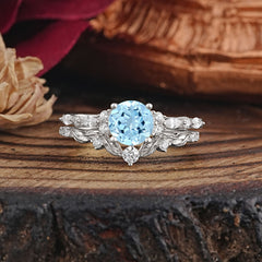 Vintage Botanical 4-Prong Round Cut Aquamarine Ring
