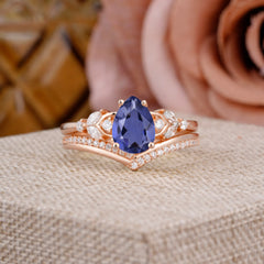 Luxurious Vintage-Inspired 4-Prong Pear-Cut Tanzanite Engagement Ring Set