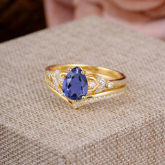 Luxurious Vintage-Inspired 4-Prong Pear-Cut Tanzanite Engagement Ring Set