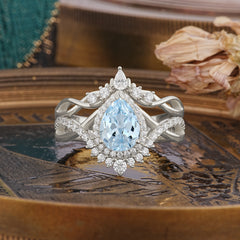 Elegant Pear-Cut Aquamarine Engagement Ring Set