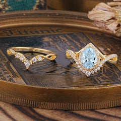 Elegant Pear-Cut Aquamarine Engagement Ring Set