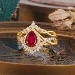 Elegant Pear-Cut Ruby Engagement Ring Set