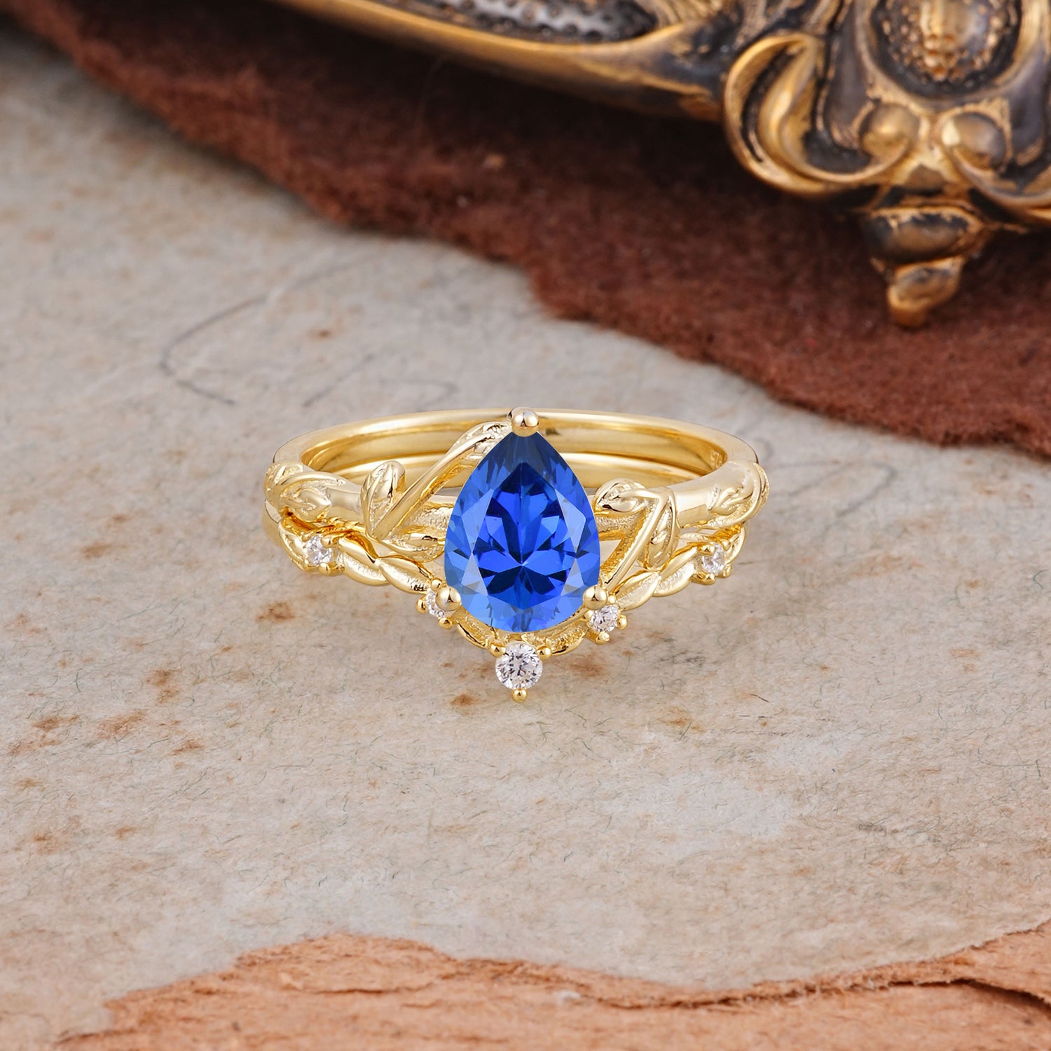 3 Prong Delicate Twisted Vine Wrapped Prong Pear Cut Sapphire Bridal Ring Set