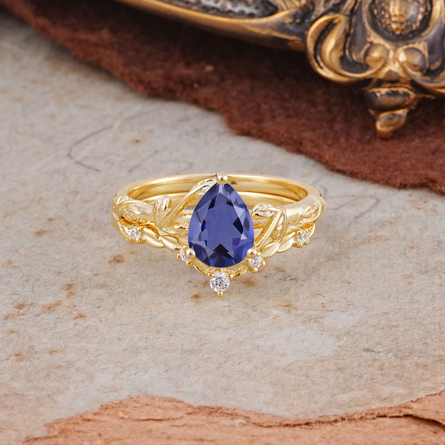 Delicate Twisted Vine Wrapped Prong Pear Cut Tanzanite Bridal Ring Set