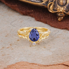 Delicate Twisted Vine Wrapped Prong Pear Cut Tanzanite Stackable Rings