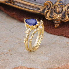 Delicate Twisted Vine Wrapped Prong Pear Cut Tanzanite Stackable Rings