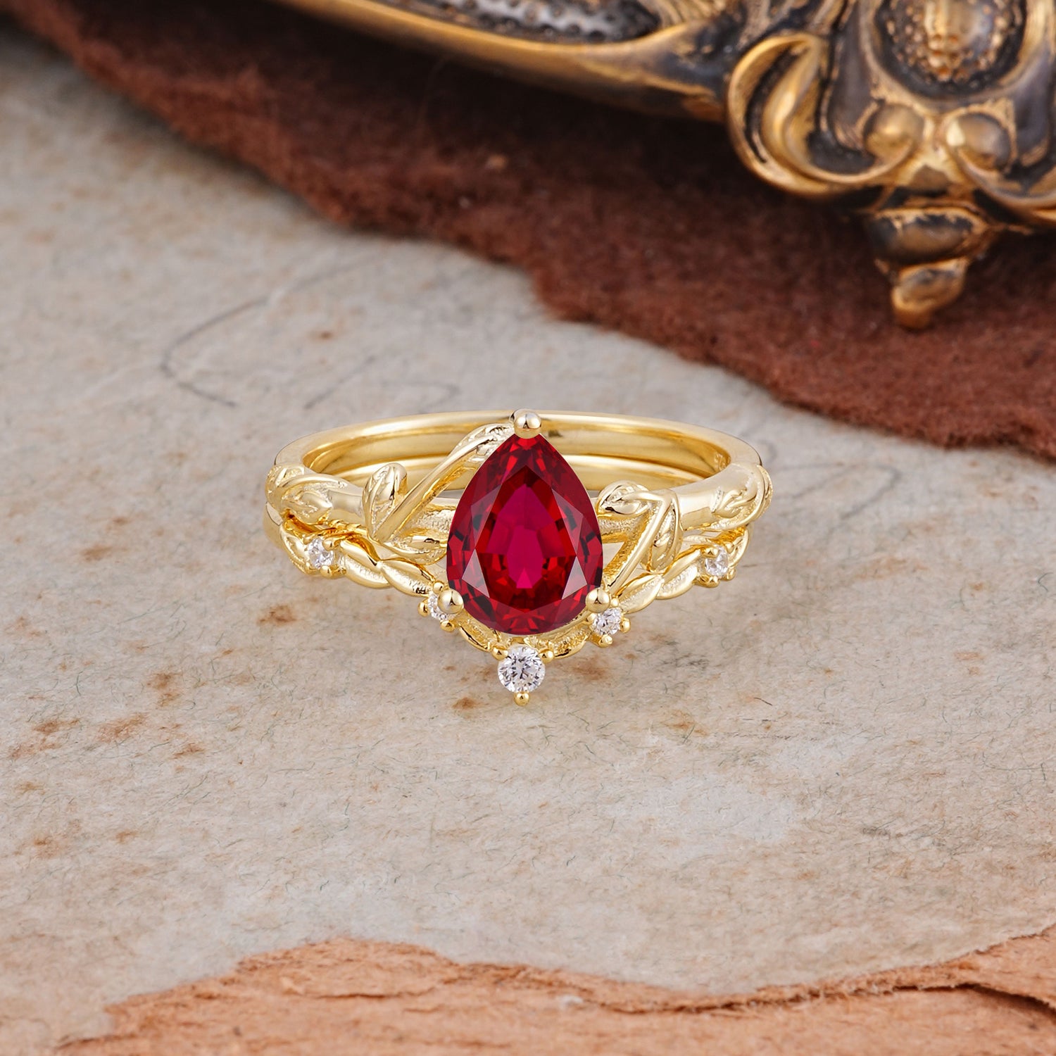 3 Prong Delicate Twisted Vine Wrapped Prong Pear Cut Ruby Bridal Ring Set