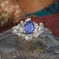 1.15 CT Delicate Leaf Accented 4 Prong Oval Shaped Tanzanite Ring Sets
