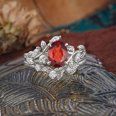 1.15 CT Delicate Leaf Accented 4 Prong Oval Shaped Garnet Ring Sets