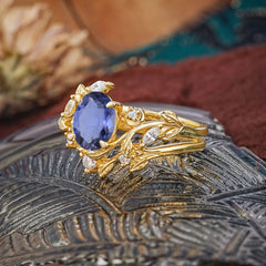 1.15 CT Delicate Leaf Accented 4 Prong Oval Shaped Tanzanite Ring Sets