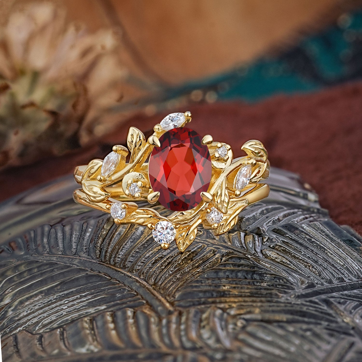 1.15 CT Delicate Leaf Accented 4 Prong Oval Shaped Garnet Bridal Ring Set