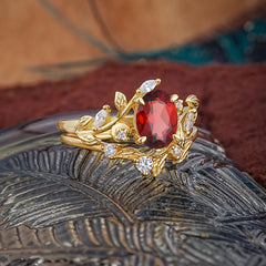 1.15 CT Delicate Leaf Accented 4 Prong Oval Shaped Garnet Ring Sets