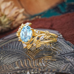 1.15 CT Delicate Leaf Accented 4 Prong Oval Shaped Aquamarine Ring Sets