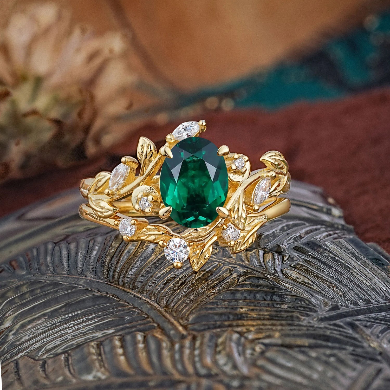 1.15 CT Delicate Leaf Accented 4 Prong Oval Shaped Emerald Bridal Ring Set
