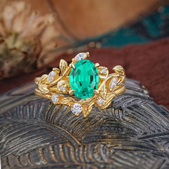 1.15 CT Delicate Leaf Accented 4 Prong Oval Shaped Emerald Ring Sets