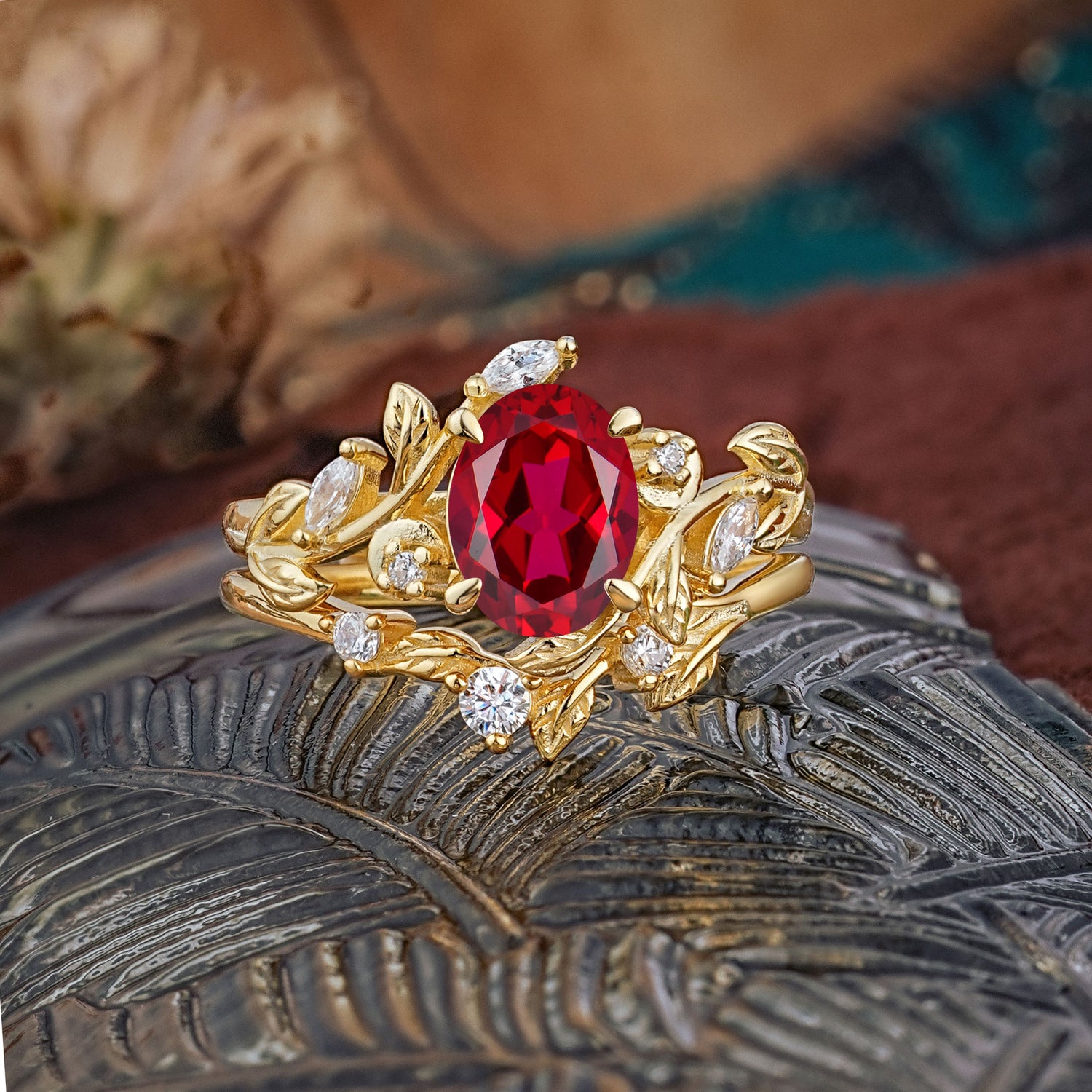 1.15 CT Delicate Leaf Accented 4 Prong Oval Shaped Ruby Bridal Ring Set