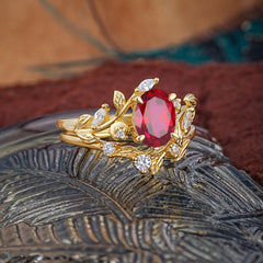 1.15 CT Delicate Leaf Accented 4 Prong Oval Shaped Ruby Ring Sets