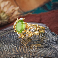 1.15 CT Delicate Leaf Accented 4 Prong Oval Shaped Peridot Ring Sets