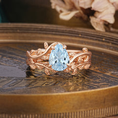 Artistic Vine Themed 4 - Prong Pear Cut Aquamarine Stackable Rings
