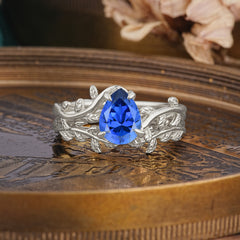 Artistic Vine  Themed 4 - Prong Pear Cut Sapphire Stackable Rings