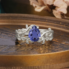 Artistic Vine  Themed 4 - Prong Pear Cut Tanzanite Stackable Rings