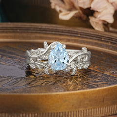 Artistic Vine Themed 4 - Prong Pear Cut Aquamarine Stackable Rings